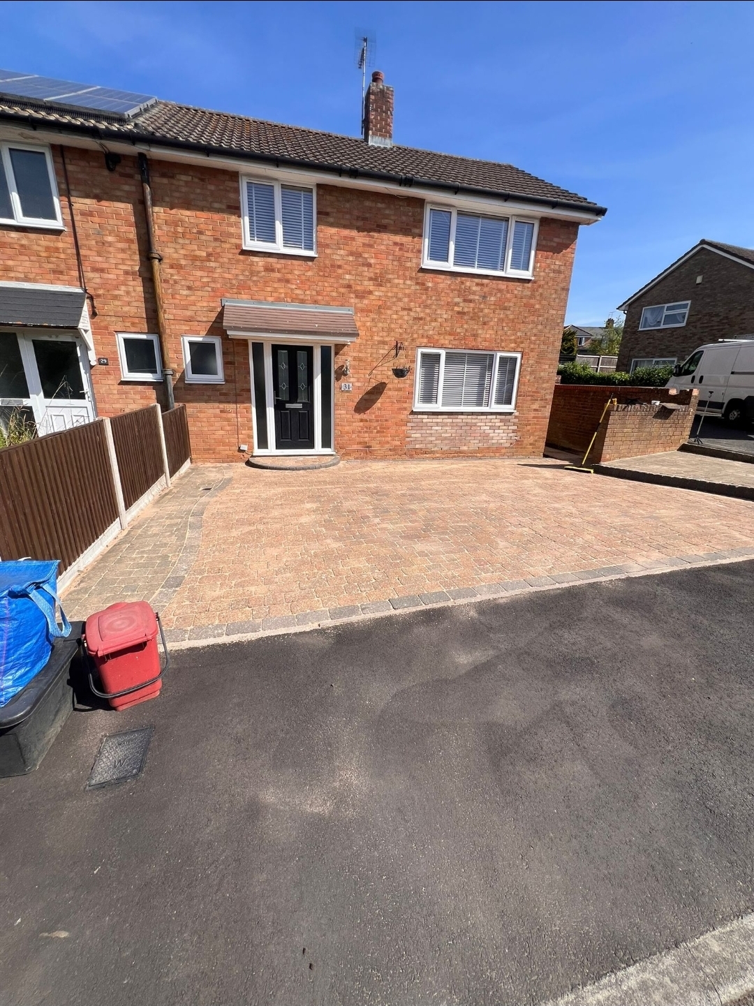 Freshly cleaned block paving driveway outside a Stevenage home